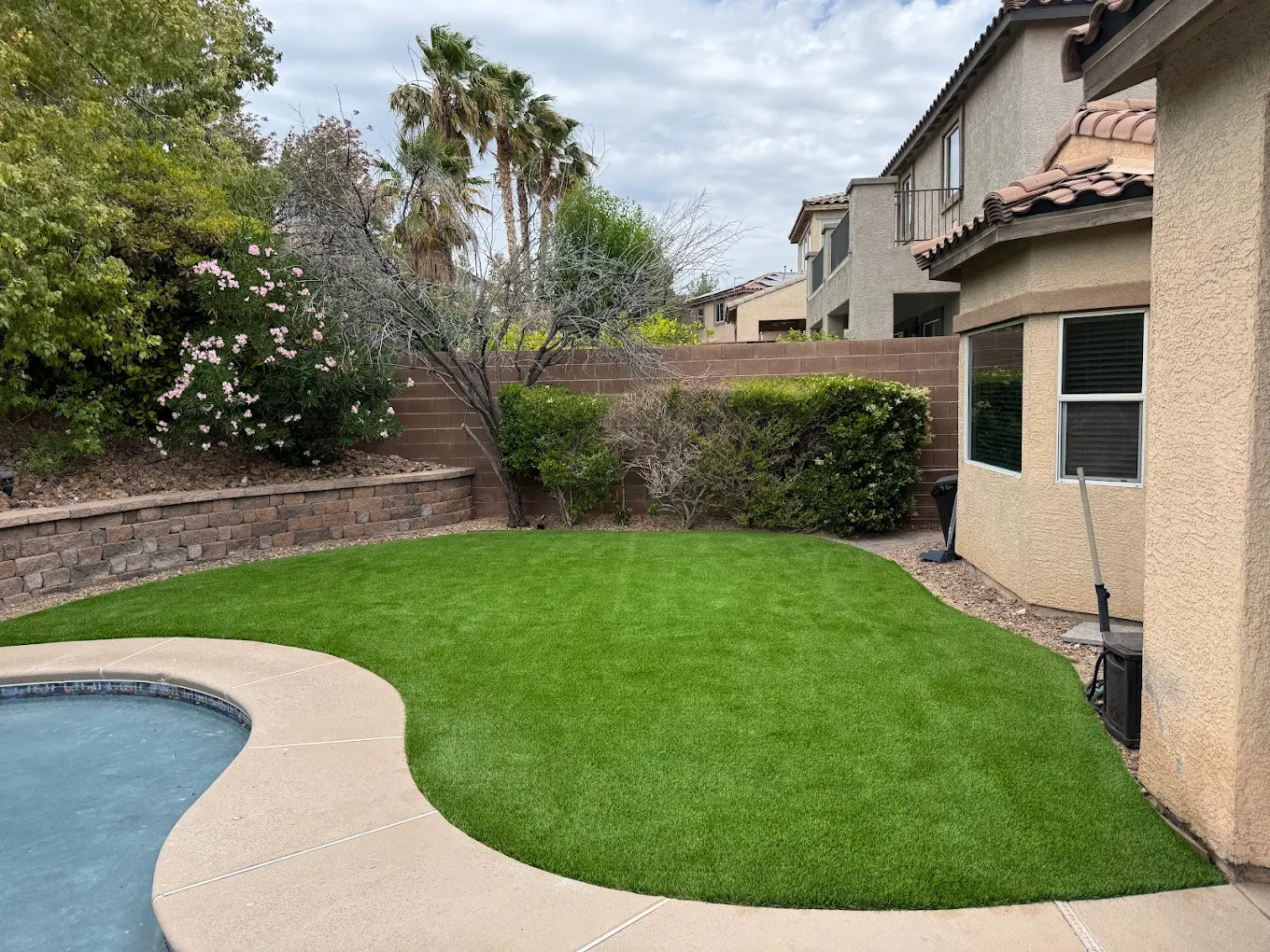Artificial turf next to pool area in Las Vegas home